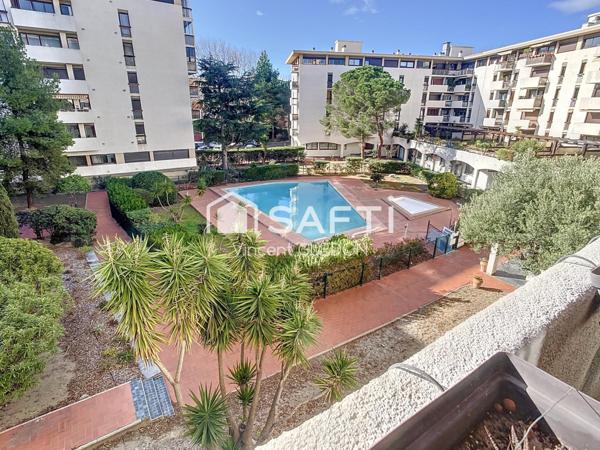 Appartement avec vue piscine cave et stationnement