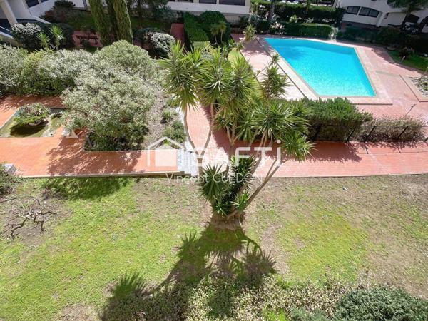 Appartement avec vue piscine cave et stationnement