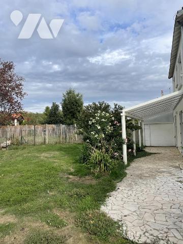 QUARTIER SACRÉ-CŒUR / 4 CHAMBRES / GARAGE ET JARDIN