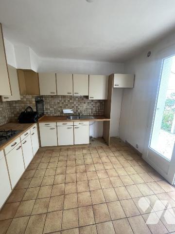 QUARTIER SACRÉ-CŒUR / 4 CHAMBRES / GARAGE ET JARDIN