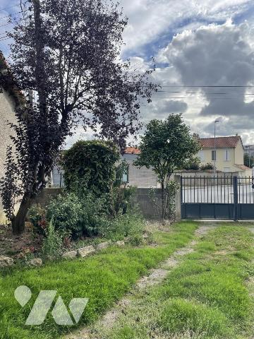 QUARTIER SACRÉ-CŒUR / 4 CHAMBRES / GARAGE ET JARDIN