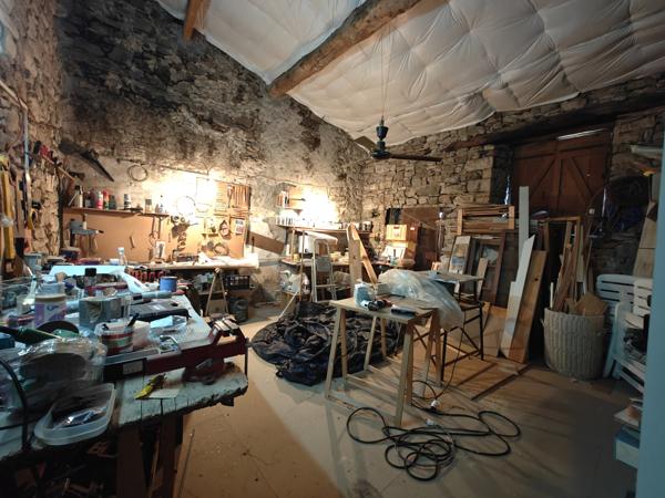 ROQUETAILLADE-MAISON DE VILLAGE EN PIERRE AVEC JARDIN, GARAGE ET ATELIER VENDU LOUÉE