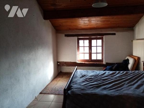 Maison de village avec terrain attenant d'environ 400 m², garage et grenier