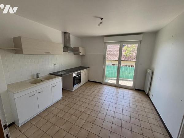 Appartement T4 au 1er (environ 110 m² habitables) avec garage - secteur calme (proche frontière)