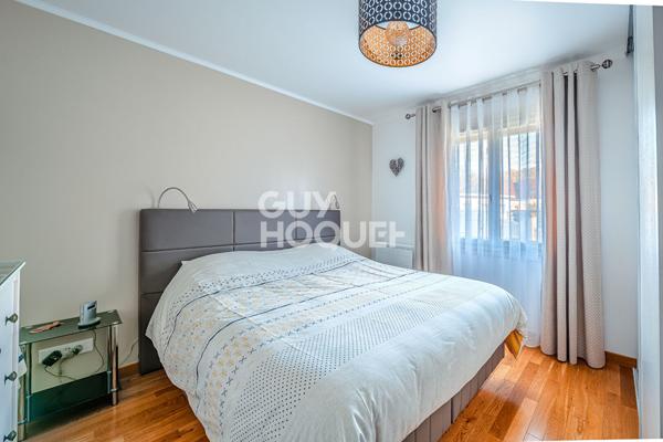 Maison familiale avec véranda de 28 m² et sous-sol total dans secteur recherché