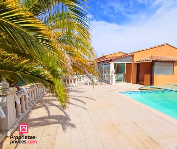 Maison de plain-pied avec possibilité de studio indépendant, piscine et terrain arboré