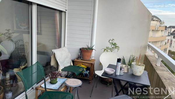 Confort et emplacement idéal : grand T4 avec terrasse ensoleillée, garage et cave à Auray