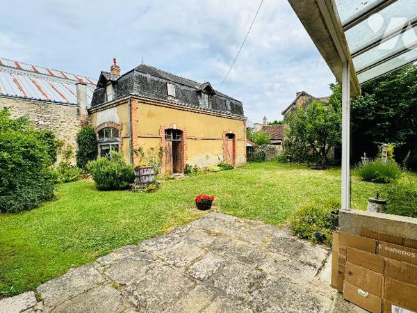 Maison centre ville avec garages