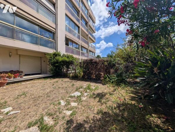  Adorable 2 pièces en rez-de-jardin avec grand extérieur au calme