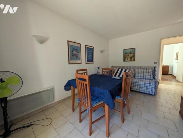  Adorable 2 pièces en rez-de-jardin avec grand extérieur au calme