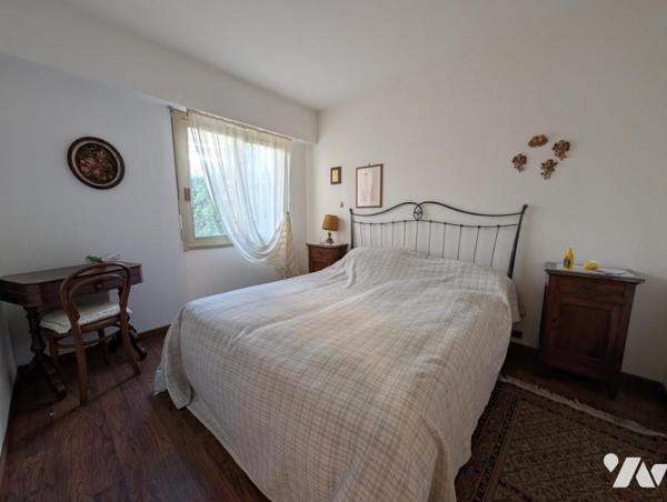  Adorable 2 pièces en rez-de-jardin avec grand extérieur au calme
