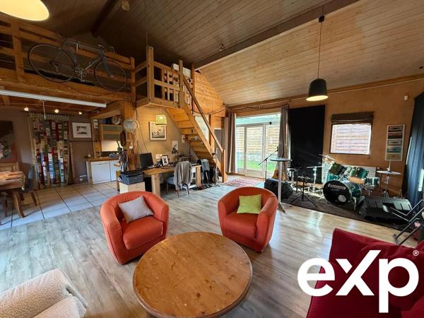 Maison mitoyenne avec atelier