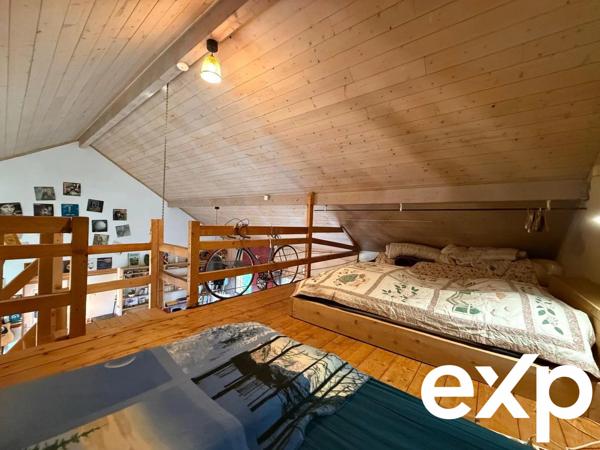 Maison mitoyenne avec atelier