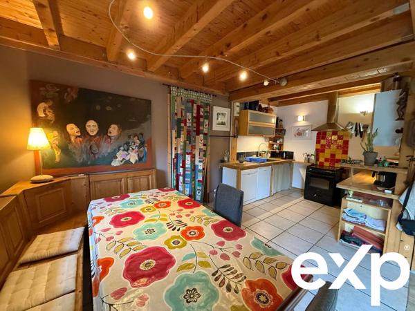 Maison mitoyenne avec atelier