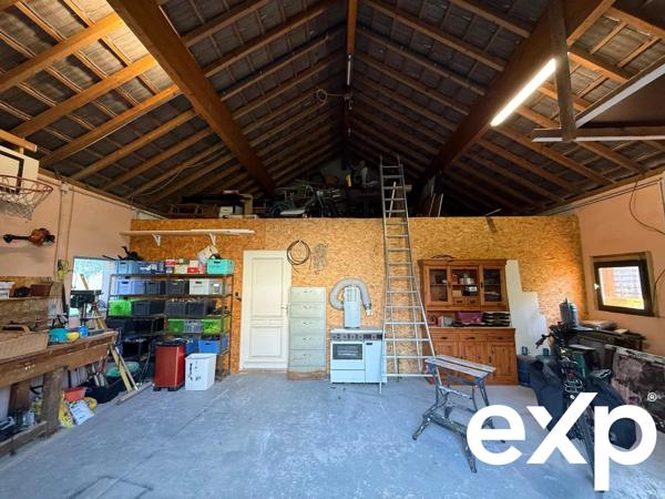 Maison mitoyenne avec atelier