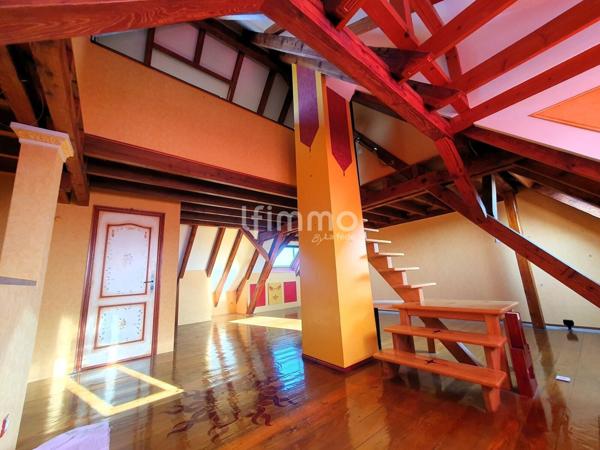 Duplex atypique cathédrale 101m²