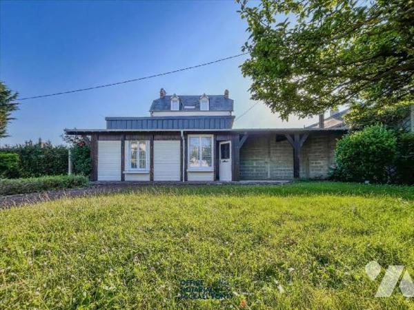 Maison d'habitation sur sous-sol comprenant :
- au rez-de-chaussée un cuisine aménagée et équip...