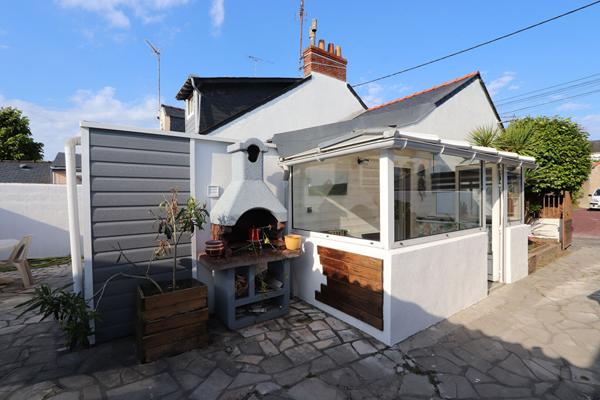 Maison familiale 3 chambres avec vie de plain-pied, cour extérieure et garage - 100 m² au sol