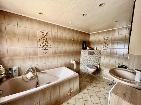 Grande maison familiale – idéale pour un projet d’habitation ou d’investissement locatif