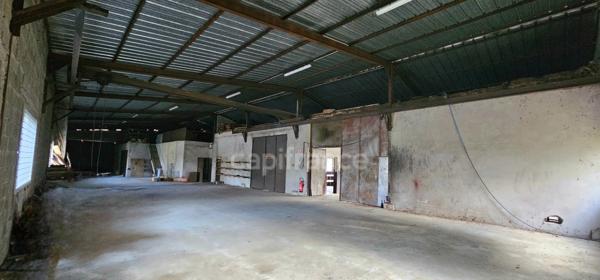 Bâtiment professionnel 1 300 m² + 7 garages – 5 min LONS LE SAUNIER (39000)