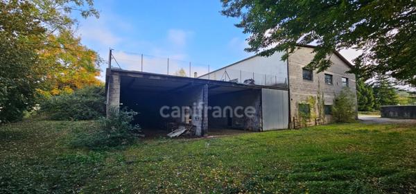 Bâtiment professionnel 1 300 m² + 7 garages – 5 min LONS LE SAUNIER (39000)