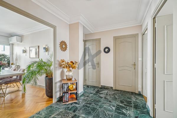 Lyon 6eme - Puvis de Chavanne: Un charmant appartement rénové de 76m2, 2 chambres, un balcon de 13m2.