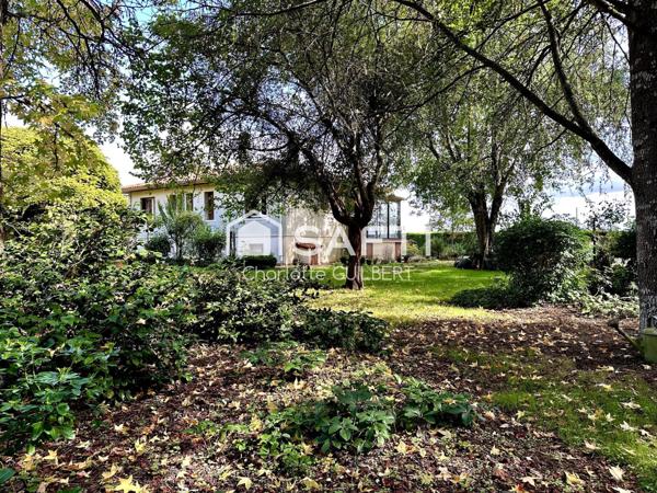 Maison 3 chambres avec garage et rendement locatif