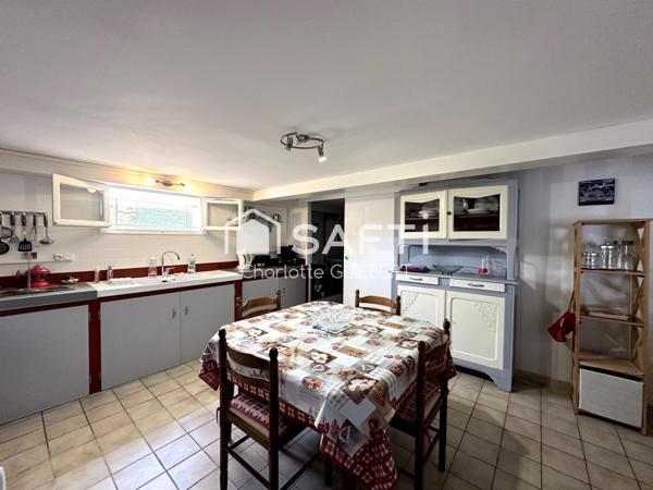 Maison 3 chambres avec garage et rendement locatif