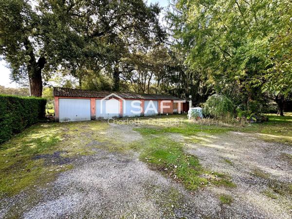 Maison 3 chambres avec garage et rendement locatif