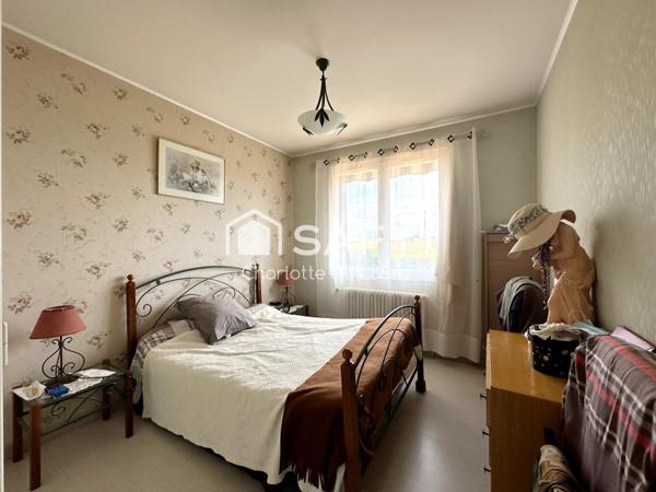 Maison 3 chambres avec garage et rendement locatif