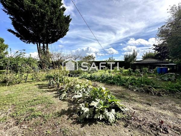 Maison 3 chambres avec garage et rendement locatif