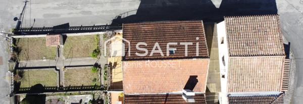 Maison T6 d'environ 140m² à rénover, avec terrasse, grand garage et jardin d'environ 150m², exposée plein sud