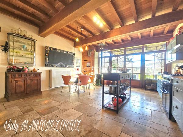 Située dans un cadre idyllique , entouré de nature et à deux minutes du centre ville, venez découvrir cette maison atypique, rénovée avec goût et conservant tout son cachet .
D'une superficie d'environ 220m², elle se compose d'une ample cuisine de 33m² menant à un grand salon - séjour lumineux de plus de 64m², hauteur sous plafond de près de 3m, sublimé par des grandes portes fenêtres offrant une vue exceptionnelle sur terrasse et jardin arboré .
La maison est composée de:

Au rez-de-chaussée:
* deux chambres lumineuses dont la chambre parentale de 23m² avec salle de bain de 16.50m²
* une cuisine avec insert 
* Buanderie de plus de 23m²
* un studio de 45m² avec de la pierre et des poutres apparentes

À l'étage:
* chambre de 24 m² avec une grande verrière donnant sur belle terrasse et vue sur piscine.
* salle d'eau 
* combles semi - aménagés, près de 170 à usage d'atelier.

Informations complémentaires:

* Menuiserie en double vitrage et bois de chaîne.
* Électricité aux normes.
* Pompe à chaleur air - eau chaude
* Toiture refaite il y a 7 ans.
* Hangar
* cuisine aménagée et équipée
* terrasse de 112m²
* carrelage en travertin de Turquie 
* parquet flottant 
* piscine  8x4 refaite en 2019
* Pompe à chaleur
* La maison profite d'une alarme et son équipement d'une valeur de 600€ que vous pourrez conserver.

Cette maison représente une belle opportunité pour les amateurs de rénovation souhaitant créer un lieu de vie à leur image, dans un secteur privilégié.

Contactez moi rapidement pour organiser une visite