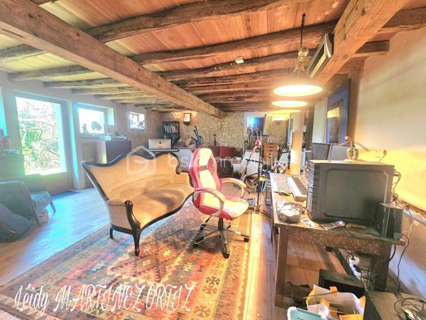 Située dans un cadre idyllique , entouré de nature et à deux minutes du centre ville, venez découvrir cette maison atypique, rénovée avec goût et conservant tout son cachet .
D'une superficie d'environ 220m², elle se compose d'une ample cuisine de 33m² menant à un grand salon - séjour lumineux de plus de 64m², hauteur sous plafond de près de 3m, sublimé par des grandes portes fenêtres offrant une vue exceptionnelle sur terrasse et jardin arboré .
La maison est composée de:

Au rez-de-chaussée:
* deux chambres lumineuses dont la chambre parentale de 23m² avec salle de bain de 16.50m²
* une cuisine avec insert 
* Buanderie de plus de 23m²
* un studio de 45m² avec de la pierre et des poutres apparentes

À l'étage:
* chambre de 24 m² avec une grande verrière donnant sur belle terrasse et vue sur piscine.
* salle d'eau 
* combles semi - aménagés, près de 170 à usage d'atelier.

Informations complémentaires:

* Menuiserie en double vitrage et bois de chaîne.
* Électricité aux normes.
* Pompe à chaleur air - eau chaude
* Toiture refaite il y a 7 ans.
* Hangar
* cuisine aménagée et équipée
* terrasse de 112m²
* carrelage en travertin de Turquie 
* parquet flottant 
* piscine  8x4 refaite en 2019
* Pompe à chaleur
* La maison profite d'une alarme et son équipement d'une valeur de 600€ que vous pourrez conserver.

Cette maison représente une belle opportunité pour les amateurs de rénovation souhaitant créer un lieu de vie à leur image, dans un secteur privilégié.

Contactez moi rapidement pour organiser une visite