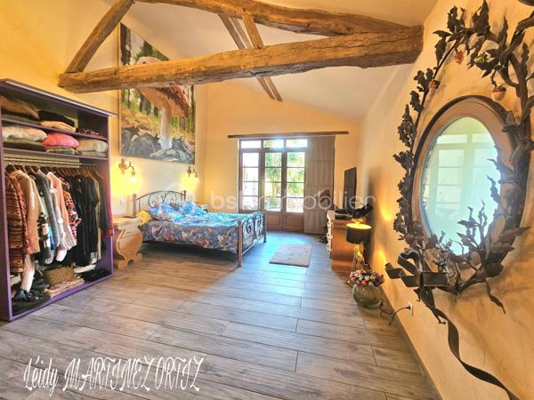 Située dans un cadre idyllique , entouré de nature et à deux minutes du centre ville, venez découvrir cette maison atypique, rénovée avec goût et conservant tout son cachet .
D'une superficie d'environ 220m², elle se compose d'une ample cuisine de 33m² menant à un grand salon - séjour lumineux de plus de 64m², hauteur sous plafond de près de 3m, sublimé par des grandes portes fenêtres offrant une vue exceptionnelle sur terrasse et jardin arboré .
La maison est composée de:

Au rez-de-chaussée:
* deux chambres lumineuses dont la chambre parentale de 23m² avec salle de bain de 16.50m²
* une cuisine avec insert 
* Buanderie de plus de 23m²
* un studio de 45m² avec de la pierre et des poutres apparentes

À l'étage:
* chambre de 24 m² avec une grande verrière donnant sur belle terrasse et vue sur piscine.
* salle d'eau 
* combles semi - aménagés, près de 170 à usage d'atelier.

Informations complémentaires:

* Menuiserie en double vitrage et bois de chaîne.
* Électricité aux normes.
* Pompe à chaleur air - eau chaude
* Toiture refaite il y a 7 ans.
* Hangar
* cuisine aménagée et équipée
* terrasse de 112m²
* carrelage en travertin de Turquie 
* parquet flottant 
* piscine  8x4 refaite en 2019
* Pompe à chaleur
* La maison profite d'une alarme et son équipement d'une valeur de 600€ que vous pourrez conserver.

Cette maison représente une belle opportunité pour les amateurs de rénovation souhaitant créer un lieu de vie à leur image, dans un secteur privilégié.

Contactez moi rapidement pour organiser une visite