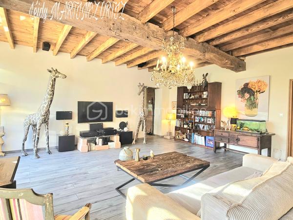 Située dans un cadre idyllique , entouré de nature et à deux minutes du centre ville, venez découvrir cette maison atypique, rénovée avec goût et conservant tout son cachet .
D'une superficie d'environ 220m², elle se compose d'une ample cuisine de 33m² menant à un grand salon - séjour lumineux de plus de 64m², hauteur sous plafond de près de 3m, sublimé par des grandes portes fenêtres offrant une vue exceptionnelle sur terrasse et jardin arboré .
La maison est composée de:

Au rez-de-chaussée:
* deux chambres lumineuses dont la chambre parentale de 23m² avec salle de bain de 16.50m²
* une cuisine avec insert 
* Buanderie de plus de 23m²
* un studio de 45m² avec de la pierre et des poutres apparentes

À l'étage:
* chambre de 24 m² avec une grande verrière donnant sur belle terrasse et vue sur piscine.
* salle d'eau 
* combles semi - aménagés, près de 170 à usage d'atelier.

Informations complémentaires:

* Menuiserie en double vitrage et bois de chaîne.
* Électricité aux normes.
* Pompe à chaleur air - eau chaude
* Toiture refaite il y a 7 ans.
* Hangar
* cuisine aménagée et équipée
* terrasse de 112m²
* carrelage en travertin de Turquie 
* parquet flottant 
* piscine  8x4 refaite en 2019
* Pompe à chaleur
* La maison profite d'une alarme et son équipement d'une valeur de 600€ que vous pourrez conserver.

Cette maison représente une belle opportunité pour les amateurs de rénovation souhaitant créer un lieu de vie à leur image, dans un secteur privilégié.

Contactez moi rapidement pour organiser une visite
