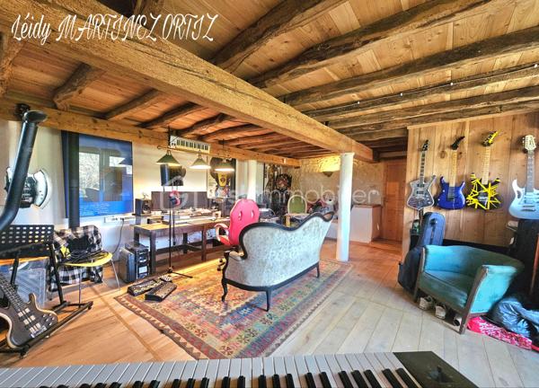 Située dans un cadre idyllique , entouré de nature et à deux minutes du centre ville, venez découvrir cette maison atypique, rénovée avec goût et conservant tout son cachet .
D'une superficie d'environ 220m², elle se compose d'une ample cuisine de 33m² menant à un grand salon - séjour lumineux de plus de 64m², hauteur sous plafond de près de 3m, sublimé par des grandes portes fenêtres offrant une vue exceptionnelle sur terrasse et jardin arboré .
La maison est composée de:

Au rez-de-chaussée:
* deux chambres lumineuses dont la chambre parentale de 23m² avec salle de bain de 16.50m²
* une cuisine avec insert 
* Buanderie de plus de 23m²
* un studio de 45m² avec de la pierre et des poutres apparentes

À l'étage:
* chambre de 24 m² avec une grande verrière donnant sur belle terrasse et vue sur piscine.
* salle d'eau 
* combles semi - aménagés, près de 170 à usage d'atelier.

Informations complémentaires:

* Menuiserie en double vitrage et bois de chaîne.
* Électricité aux normes.
* Pompe à chaleur air - eau chaude
* Toiture refaite il y a 7 ans.
* Hangar
* cuisine aménagée et équipée
* terrasse de 112m²
* carrelage en travertin de Turquie 
* parquet flottant 
* piscine  8x4 refaite en 2019
* Pompe à chaleur
* La maison profite d'une alarme et son équipement d'une valeur de 600€ que vous pourrez conserver.

Cette maison représente une belle opportunité pour les amateurs de rénovation souhaitant créer un lieu de vie à leur image, dans un secteur privilégié.

Contactez moi rapidement pour organiser une visite