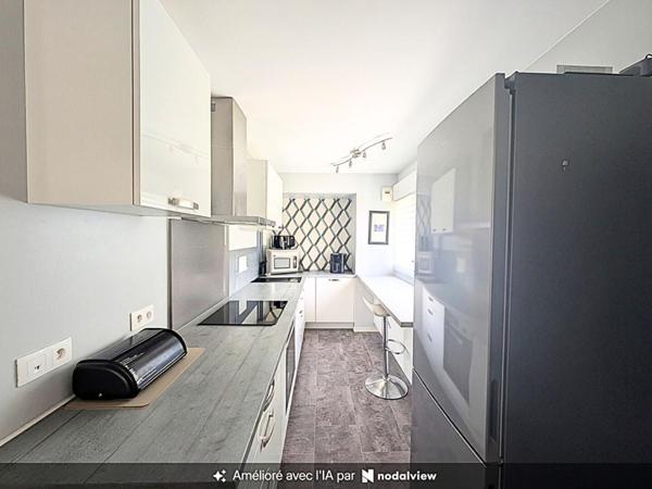 T4 duplex avec terrasse, vue sur espace vert et parking