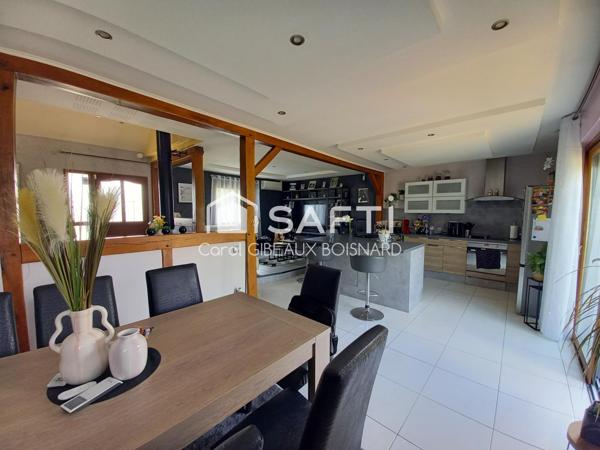 Beau pavillon avec 4 chambres, 2 garages et terrain