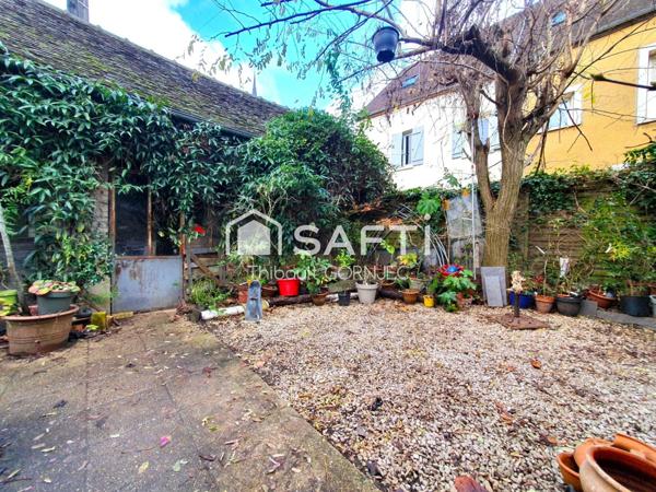 Charmant cocon de 102 m² avec extérieur et atelier, idéalement situé près de la gare de Champagne-sur-Seine.