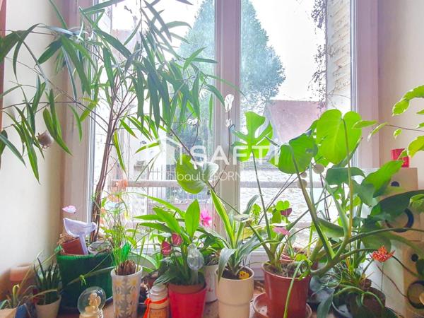 Charmant cocon de 102 m² avec extérieur et atelier, idéalement situé près de la gare de Champagne-sur-Seine.