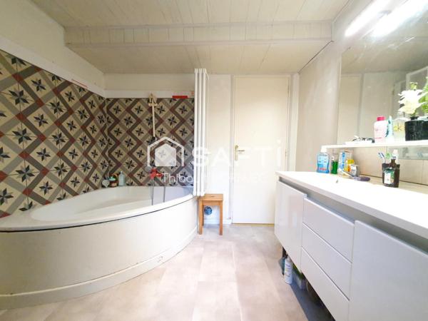 Charmant cocon de 102 m² avec extérieur et atelier, idéalement situé près de la gare de Champagne-sur-Seine.