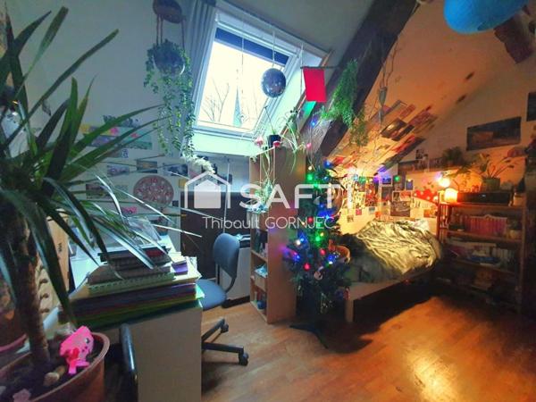 Charmant cocon de 102 m² avec extérieur et atelier, idéalement situé près de la gare de Champagne-sur-Seine.