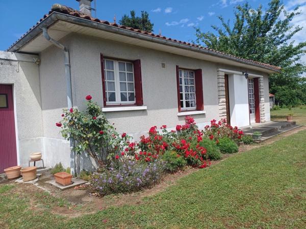 MAISON DE PLAIN PIED AVEC JARDIN ATTENANT