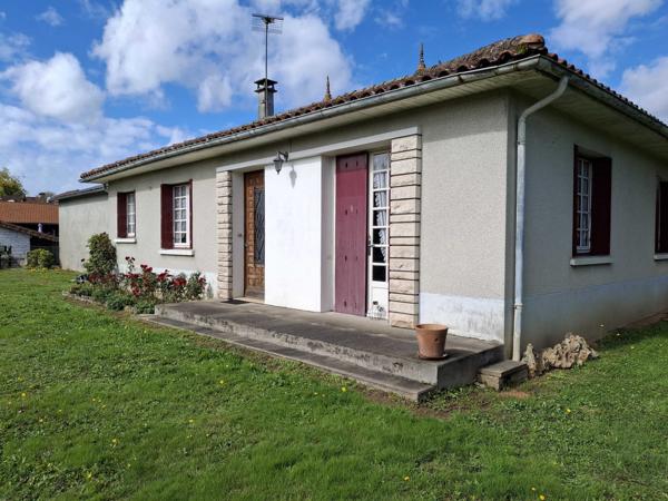MAISON DE PLAIN PIED AVEC JARDIN ATTENANT