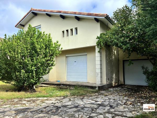 MAISON AVEC GARAGE ET JARDIN