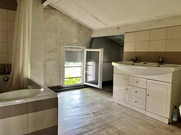 MAISON AVEC GARAGE ET JARDIN