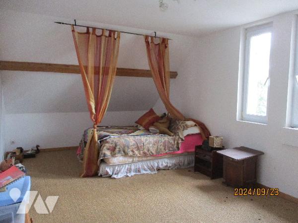 VOUZIERS, une maison d'habitation de caractère sur un terrain de 3 671 m².