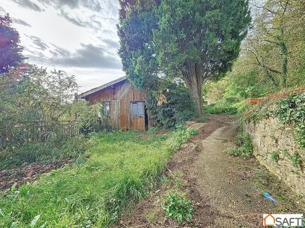 Terrain de 958m2 plein coeur d'Albigny, constrcution 250m2 possible.