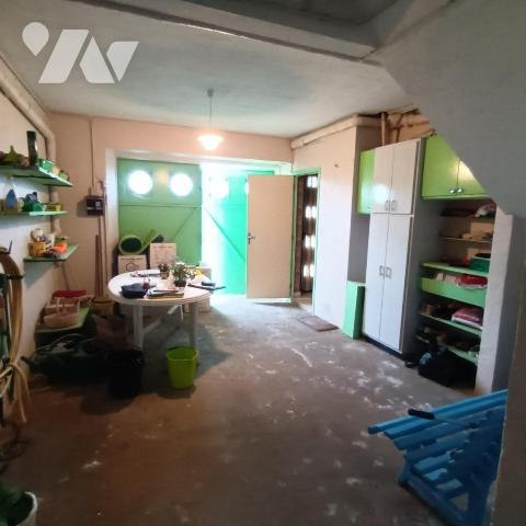 Maison T4 avec jardin, garage et dépendances